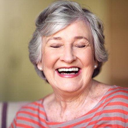 Woman smiling brightly