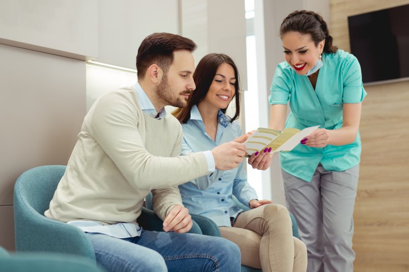 couple learning about dental insurance